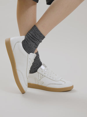 Chaussettes en coton femme noires à paillettes argent montantes avec bordure élastique Vanessa Wu